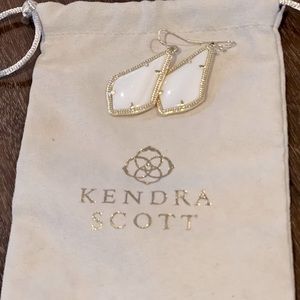Kendra Scott white & gold drop earrings.